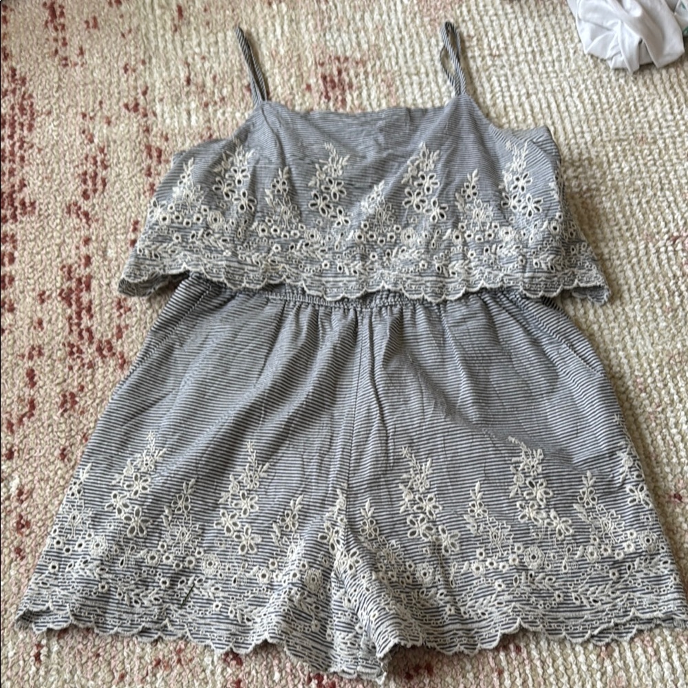 Stripped Romper with embroidered florals. Size medium. Very Good condition.